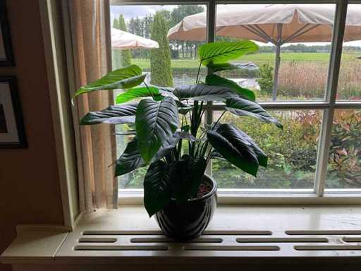 Artificial plant in pot