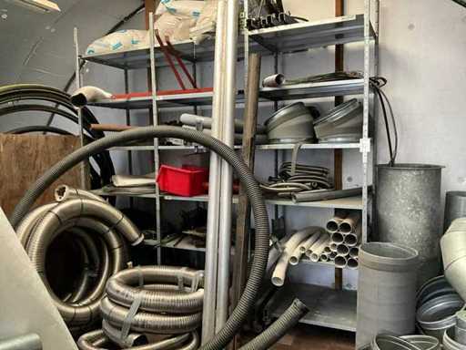 Shelf rack with contents of pipes and couplings