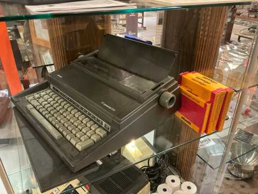 Typewriter and calculator, key cabinet, universal power supply and accessories