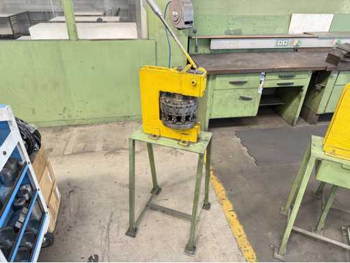   Hand hole punch 