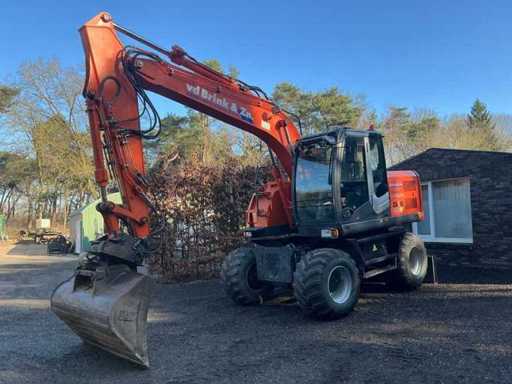 2009 Hitachi ZX140W Banden graafmachine