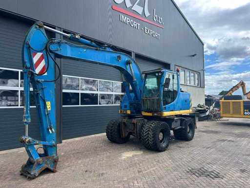 Koparka kołowa New Holland MH Plus z 2007 roku
