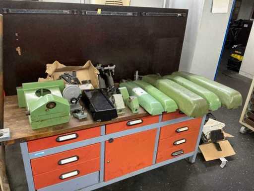 Assortment of various machine accessories (e.g. FP2 lid)