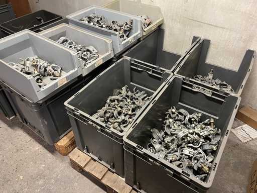 large batch of galva pipe couplings and tighten