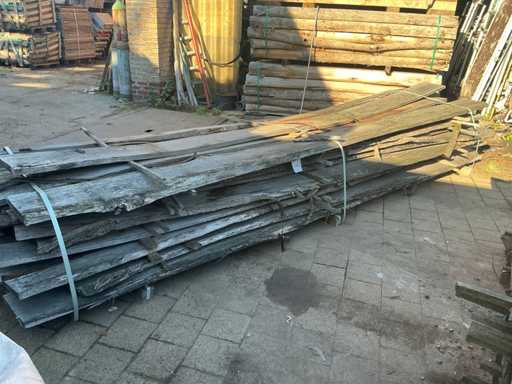 Batch of sawn tree trunk planks oak