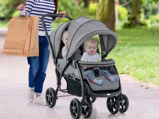 Foldable double stroller with adjustable backrest and canopy, load capacity 30 kg