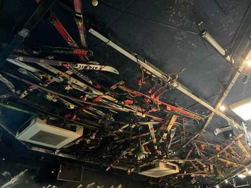 Party of skis on ceiling