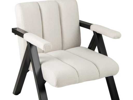 Beige lounge chair with metal frame and armrests