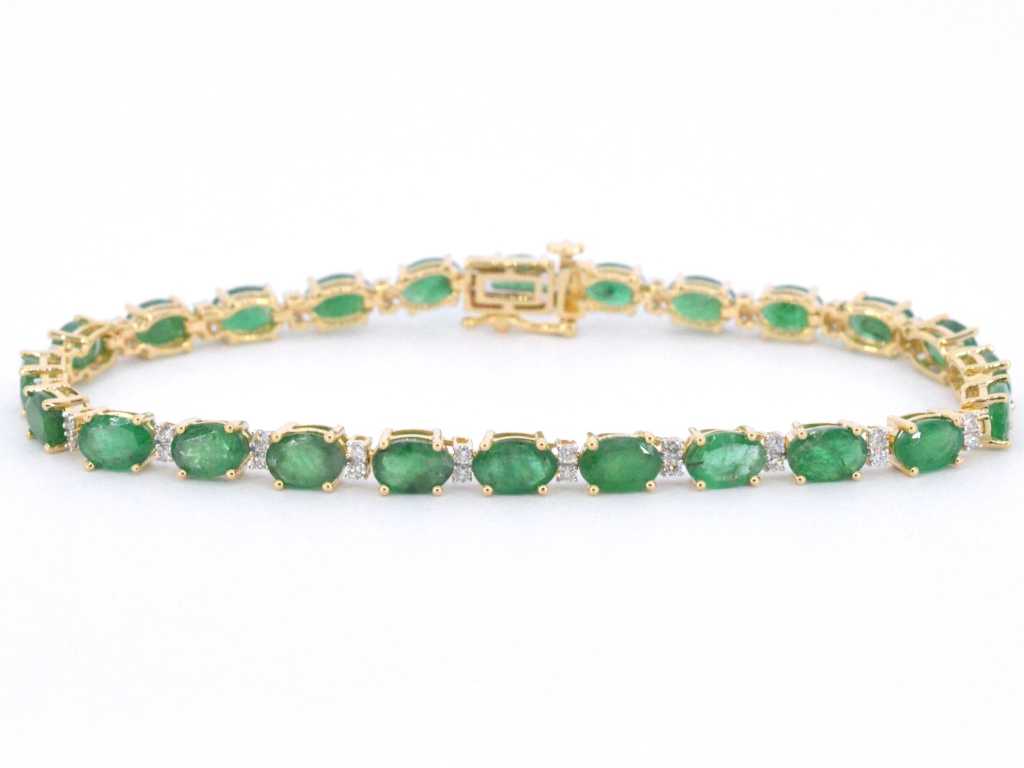 Yellow gold tennis bracelet with diamonds and emeralds