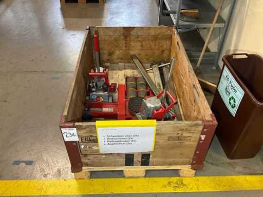 Lots of heavy-duty rollers, hydraulic jacks and accessories