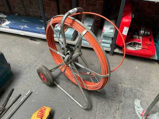 Tension spring on reel
