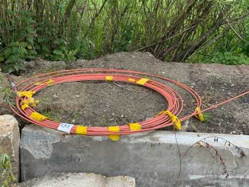 Fiber drainage piercing wire