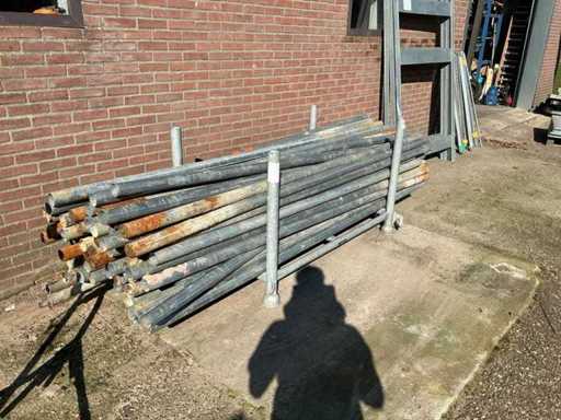 80 iron pipes in barrel