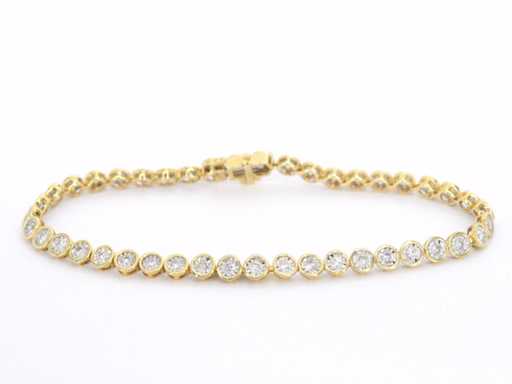 Gouden armband vol gezet met diamanten