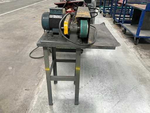 Belt sander on metal base