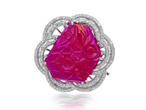 Composite ring with a large ruby surrounded by small natural diamonds