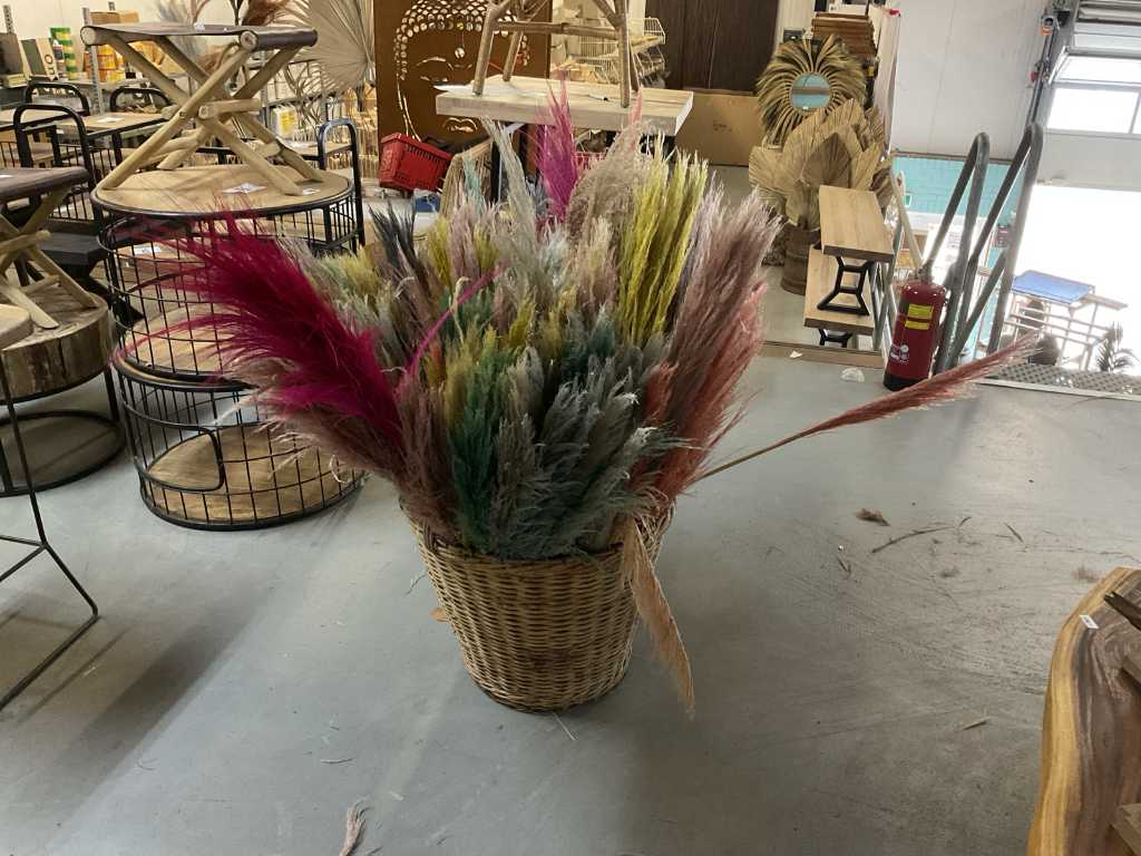 Party of decoration plumes in wicker basket