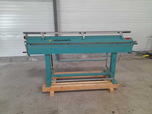 JOUANEL-ALMORE PZA2040/Eine manuelle Faltmaschine mit einer Schürze am Boden