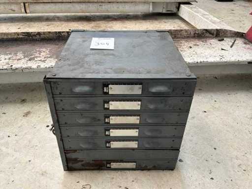 Chest of drawers with contents