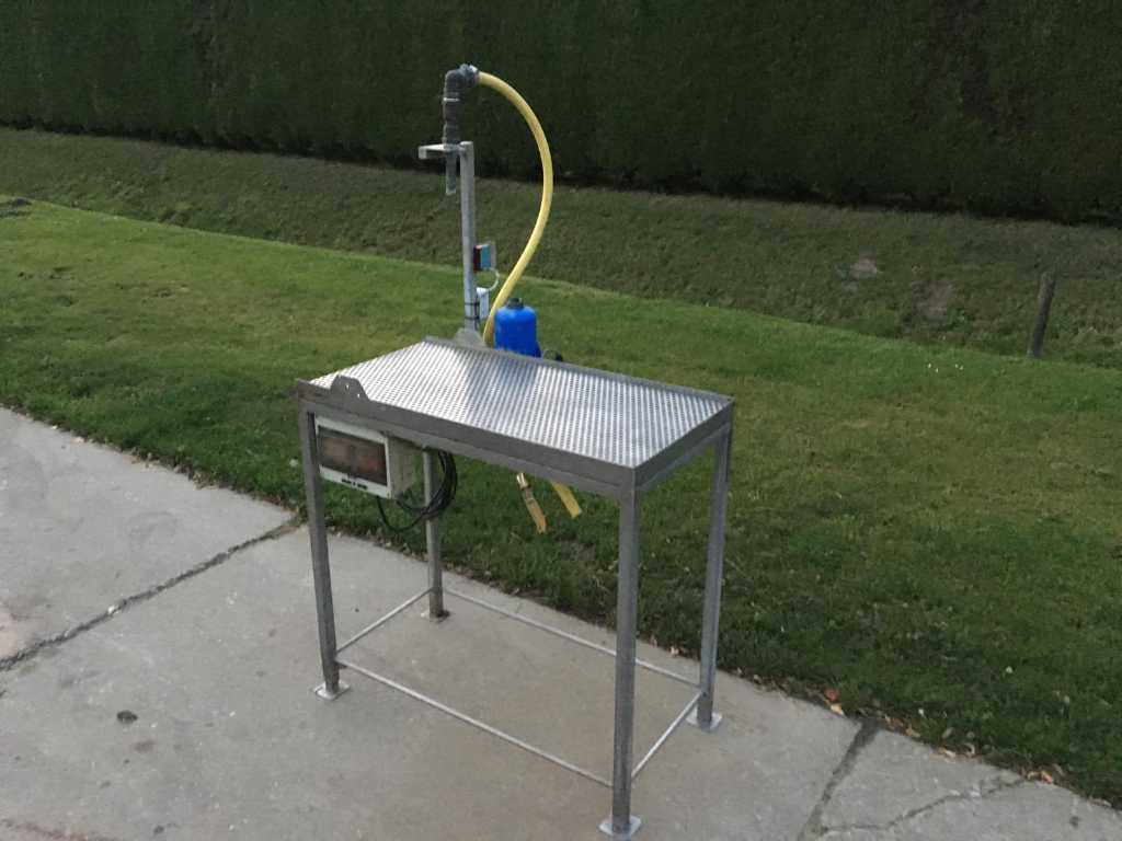 Stainless steel bucket filling table