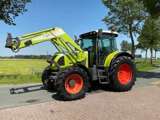 Tractor agricol Claas Ares 657 ATZ cu tracțiune integrală din 2006 și încărcător frontal 