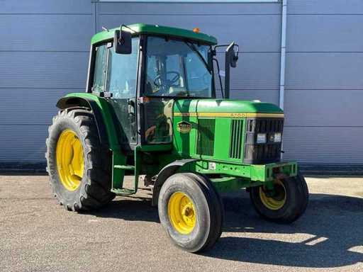 1996 John Deere 6100 Two-wheel drive farm tractor