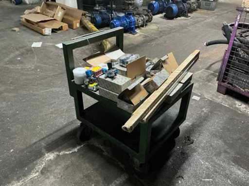 Bundle of machine spare parts including shelf transport trolley