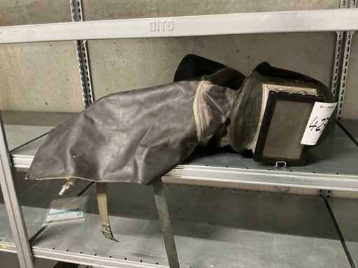 Safety helmet with tab for sandblasting work