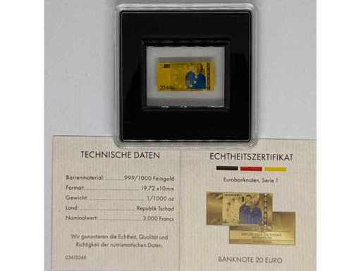 Aur 999 (1/1000 oz) – lingodonul miniatural de aur de 20 euro (design din seria Euro, Republica Ciad), 19,72 × 10 mm.