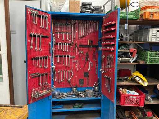 Steel workshop cabinet with various hand tools