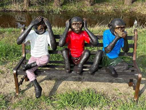 Bronze monkey on bench 1.56 meters wide
