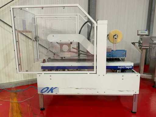 OK Packaging Systems Supertaper 1F Mașina de ambalare