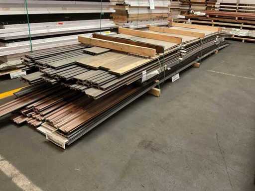 Batch of composite façade cladding and decking boards