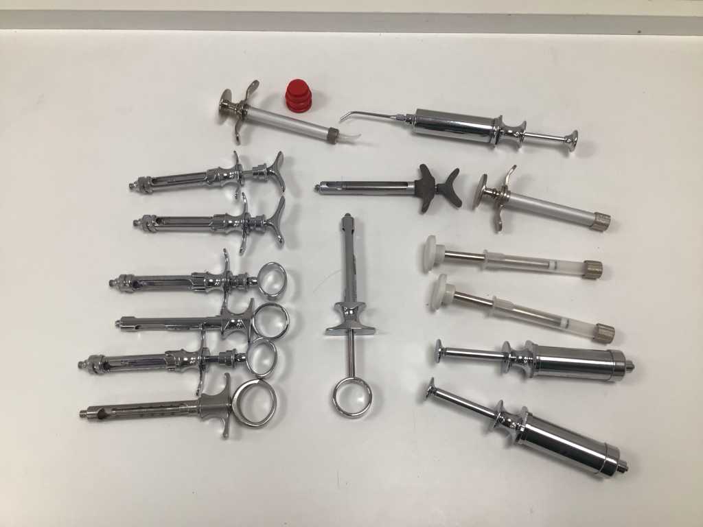 Various impregum, anesthesia and coil syringes.