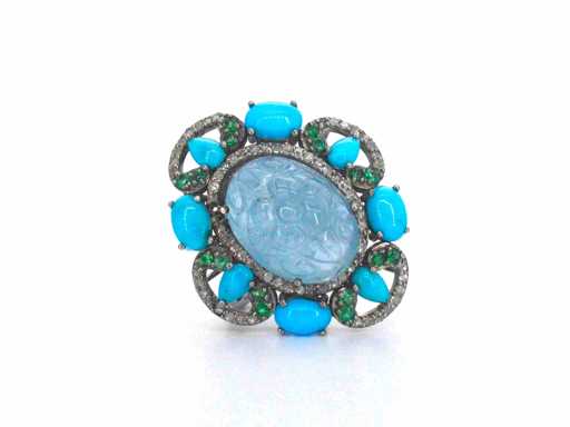 Bague fabriquée avec diverses pierres précieuses et sertie de diamants naturels blancs