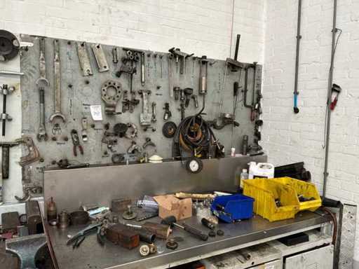 Steel workbench with back wall and contents