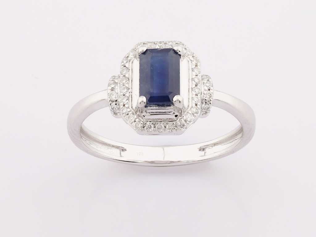 Anello in oro bianco 18 KT con diamante naturale e zaffiro blu