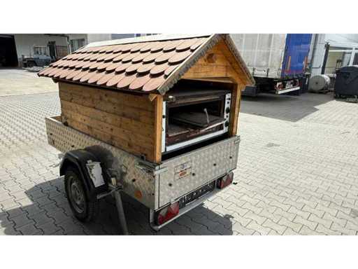 Car trailer with oven