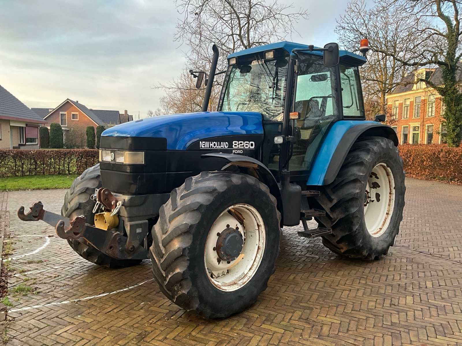 1999 New Holland 8260 Four wheel drive farm tractor