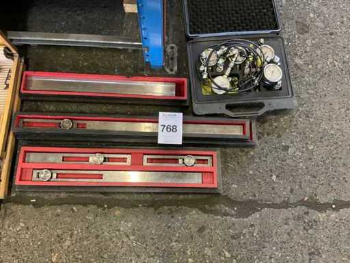 Niveaux de machine de précision