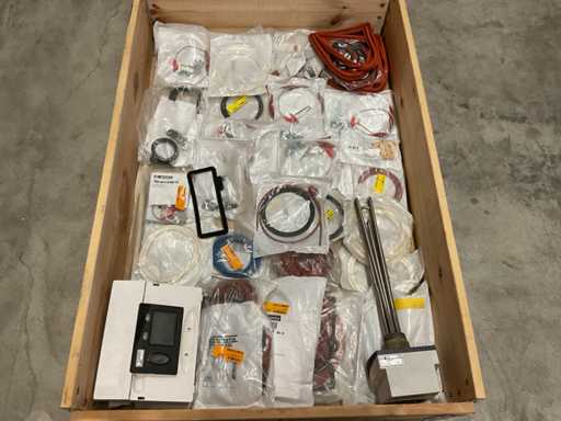 Charge von Materialien zur Zentralheizungsinstallation