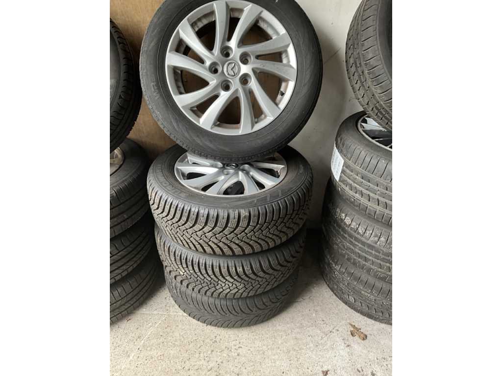 4 winter tyres with rim Mazda
