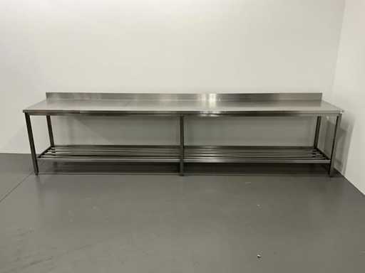 Stainless steel worktable with splashback