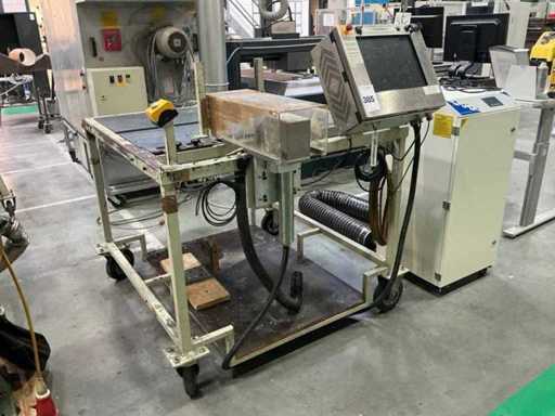 Table de travail avec dispositif laser