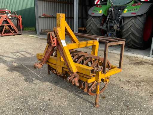 Packer à sillons avant