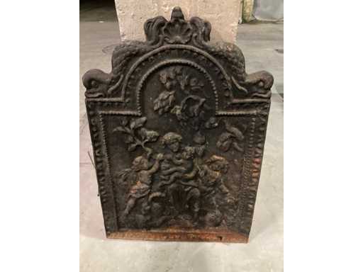 Antica piastra in ghisa per caminetto