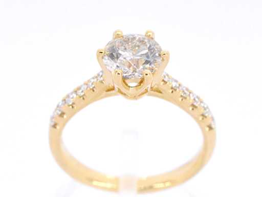 Gold ring with large diamond