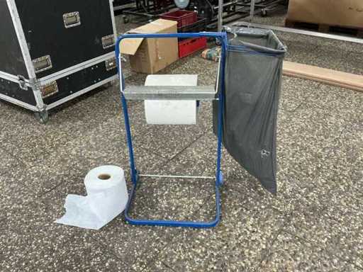 Cloth dispenser with waste bag holder