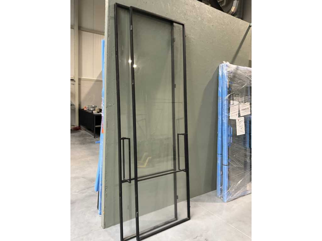 2 Steel doors, each measuring approximately 805 x 2650 mm.