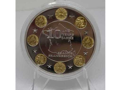 Cuivre argenté avec plaquage partiel or – pièce commémorative de 10 euros français, diamètre de 40 mm.